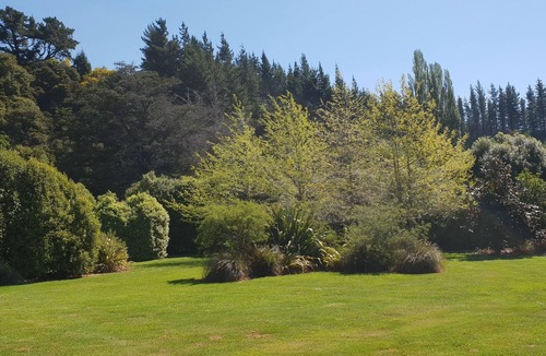 Shakespeare Bay Cottage | Stunning location garden setting, farmstead cottage!