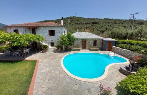 Koropi Villa | The Cocoon and olives Hut