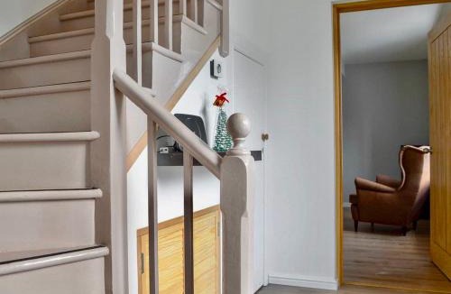 Strathcarron House | The Coolins cottage with wood burner