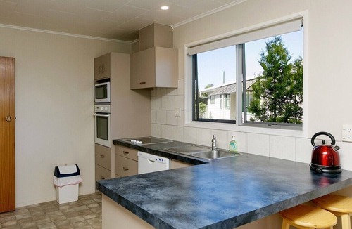 Rainbow Point Cottage | This Bach Has it All - Rainbow Point Holiday Home