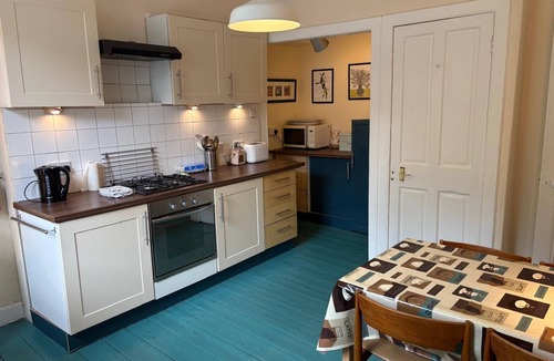 Port Bannatyne Apartment | Tideline. Waterfront ground floor spacious flat with garden and open sea views