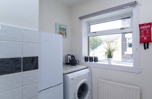 Coatbridge Apartment | Traditional ground floor apartment with main door entrance.