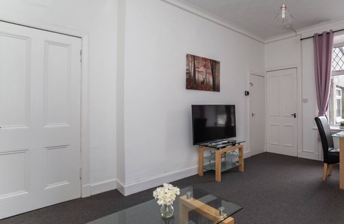 Coatbridge Apartment | Traditional ground floor apartment with main door entrance.