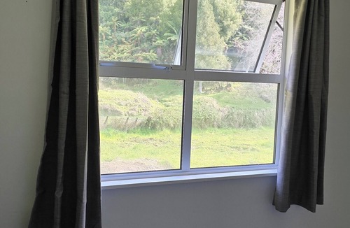 Te Anga House | Unique sunny space in natural setting. A lovely house & private access to river.