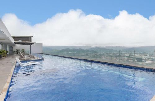 Curridabat Apartment | Urban Breeze iFreses, 10th floor! AC, TV and Pool