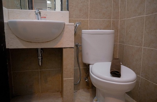 Panunggangan Utara Apartment | Warm and Minimalist Studio (No Kitchen) at Great Western Apartment