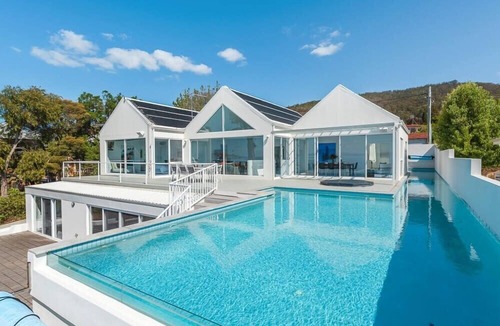 Taroona House | Waterfront Oasis with Infinity Pool and Stunning River Views