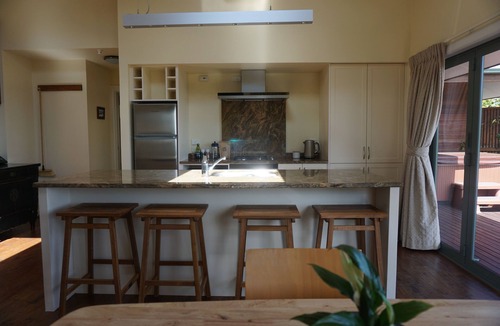 Raglan Apartment | Whenua Apartment with Spa Pool minutes from Surf Breaks