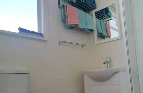 Henderson House | White weather board house - 3 bedrooms full house