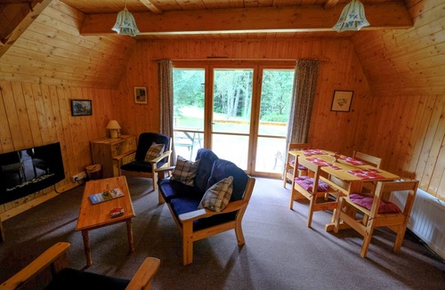 Cannich Ski Chalet | Woodland cottage nestled in woods on the banks of a glorious Highland River