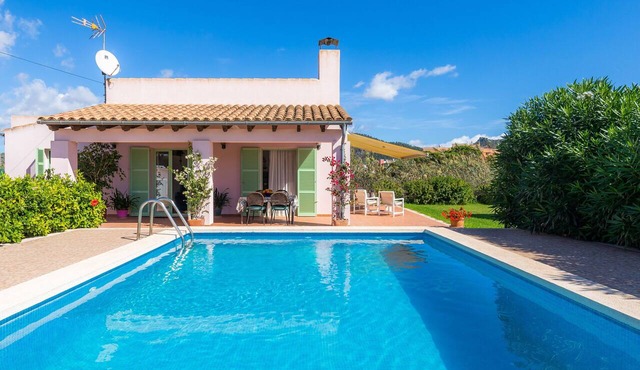 Air-Conditioned Holiday Home by the Sea with Pool, Garden, Terrace & Wi-Fi