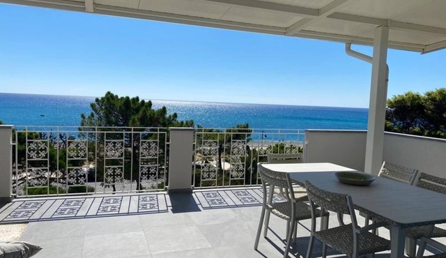 Beachfront apartment with fantastic terrace facing the Ionian Sea