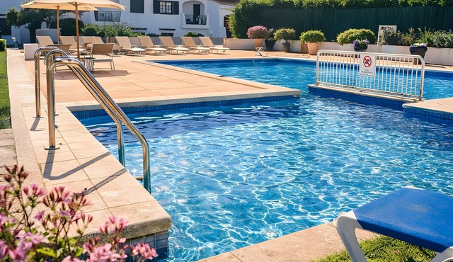 Binimar Apartment – Cala En Porter with Shared Pool, Near the Beach