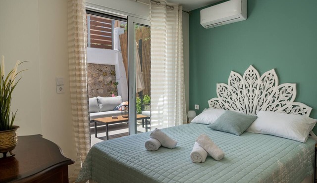 Boho style apartment with spacious front yard in historical district of Chania