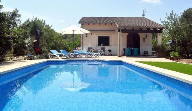 House with pool and mountain views