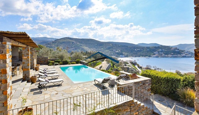 Luxurious villa in Vourkari with a swimming pool, sea and sunset view.