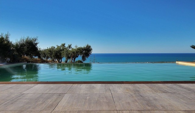 Modern property with Private Golf Practice, Private Pool, Garden, WiFi, Sea VIew