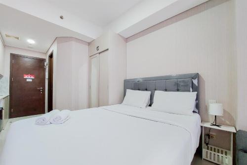 Nice and Elegant Studio near Campus at Pacific Garden Alam Sutera Apartment By Travelio