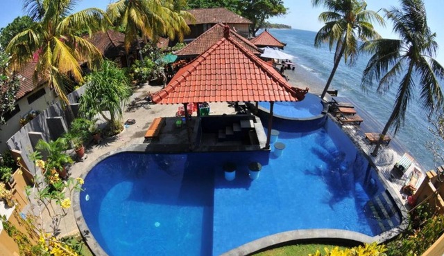 Paradise Palm Beach Bungalows and Dive Center