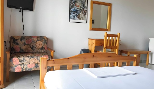 Studio Apartment 'Hotel Antigoni Triple Room 11' with Lake View, Wi-Fi and Air Conditioning
