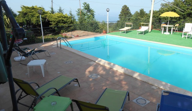 Sunrise apartment in villa with pool
