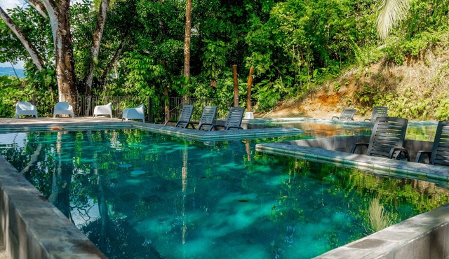 Tranquil lakefront apartment with stunning views & pool access