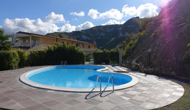 Vacation Home "Terrazzo A9" with Sea View, Shared Pool & Wi-Fi