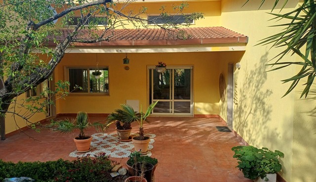 Villa entirely surrounded by garden a stone's throw from the sea.