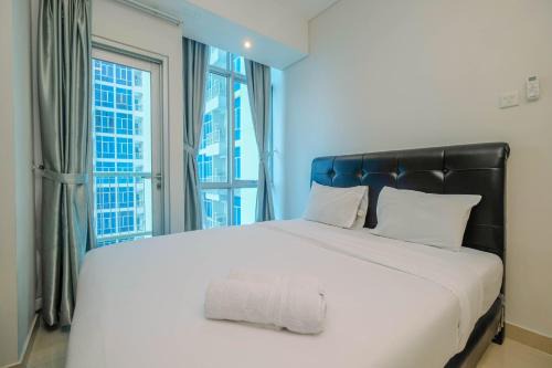 Stunning 2BR Apartment at Capitol Park Residence By Travelio
