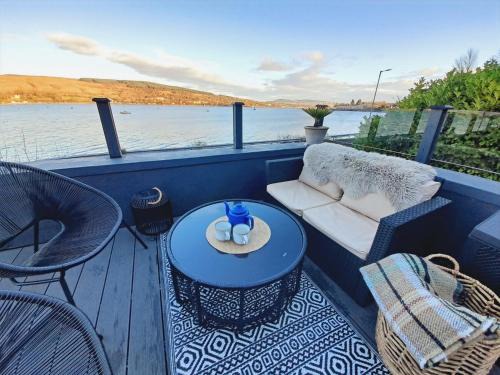 Cove House | Cosy Lochside Cottage with Mountain and Sea Views