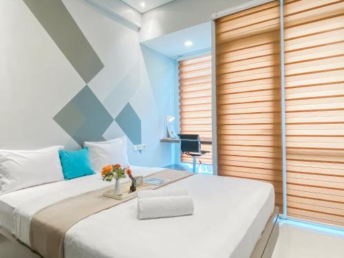 Cikarang Apartment | Cozy Living Studio Vasanta Innopark Apartment By Travelio