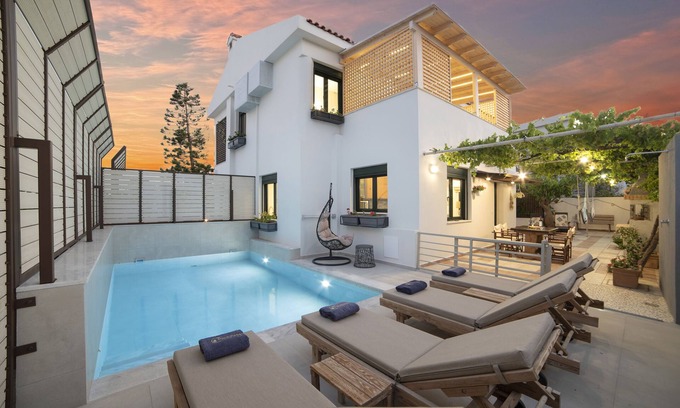 Koutsouras Condo | Two bedroom luxury condo with private patio with vineyard & BBQ near beach