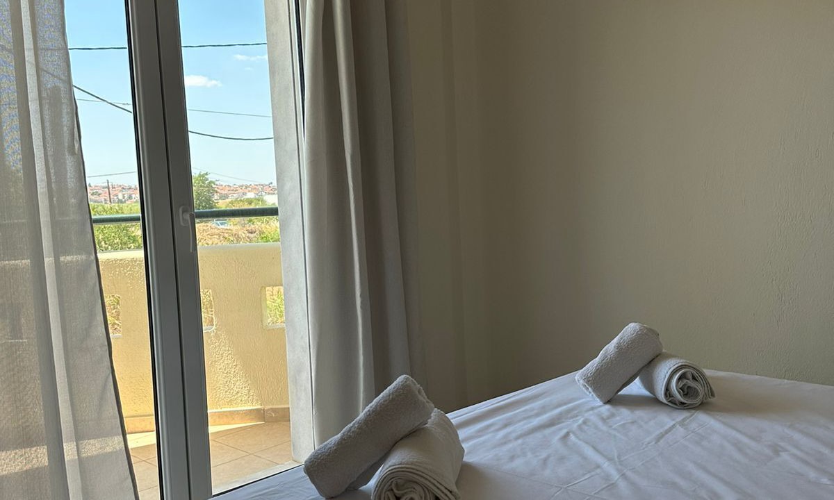 Photo of Bedroom in Paralia Dionysiou