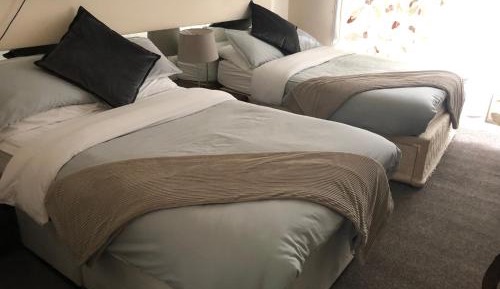 Economy Quadruple Room with Shared Bathroom