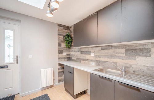 Dunure Cottage | The Harbour Nook is a gorgeous ground floor, coastal apartment situated at the harbour’s edge with l