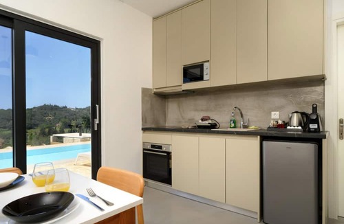 Kavvadades Villa | Lavish Corfu Villa | Villa Elysian View | 1 Bedroom | Spacious Furnished Terrace with Shaded Outdoor Dining Area | Private Garden, Pool and Hot Tub | Prime Location | Arillas, Mega Lithari